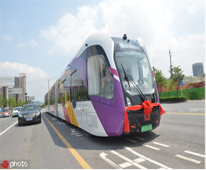 China's self-driving trackless 'rail bus' starts first overseas run